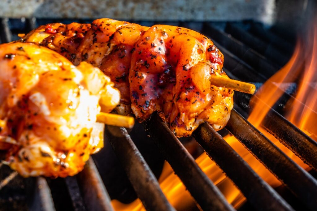 delicious skewers roasting after barbecue service technicians